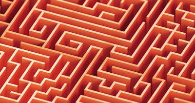 A complex, orange maze is pictured.