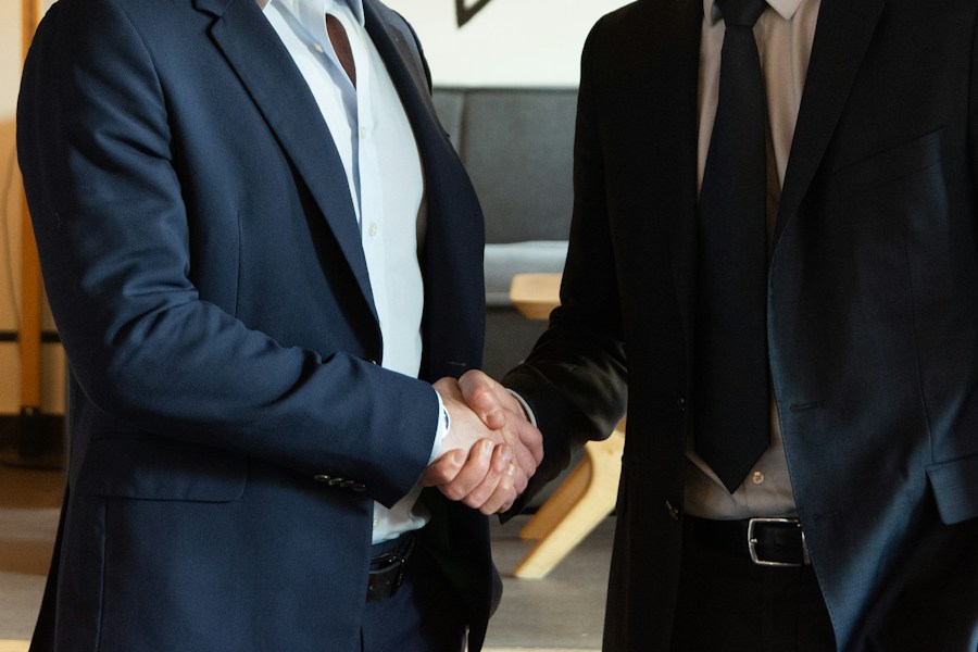 Two business partners shaking hands