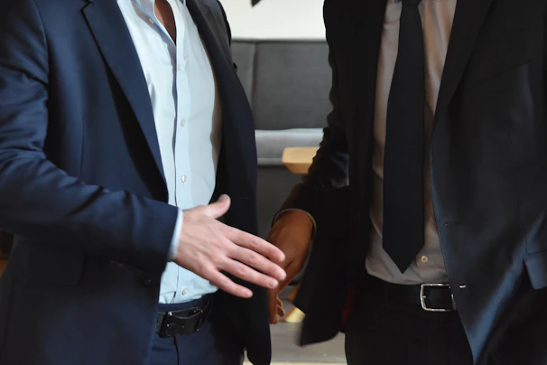 Businessmen are shaking hands in a professional gesture