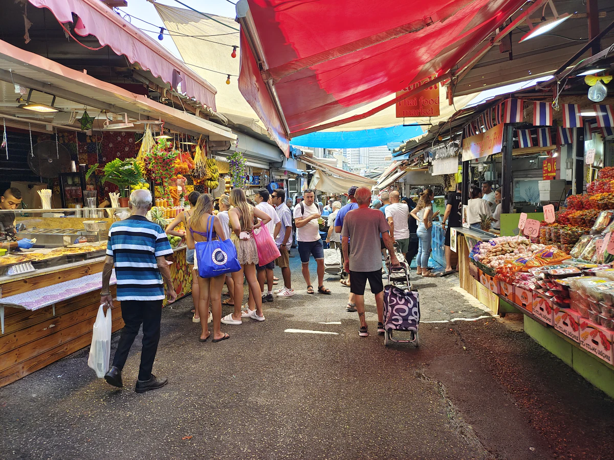 Shoppers in the market streets of Nachalat Binyamin, beside the Carmel Market in Tel Aviv