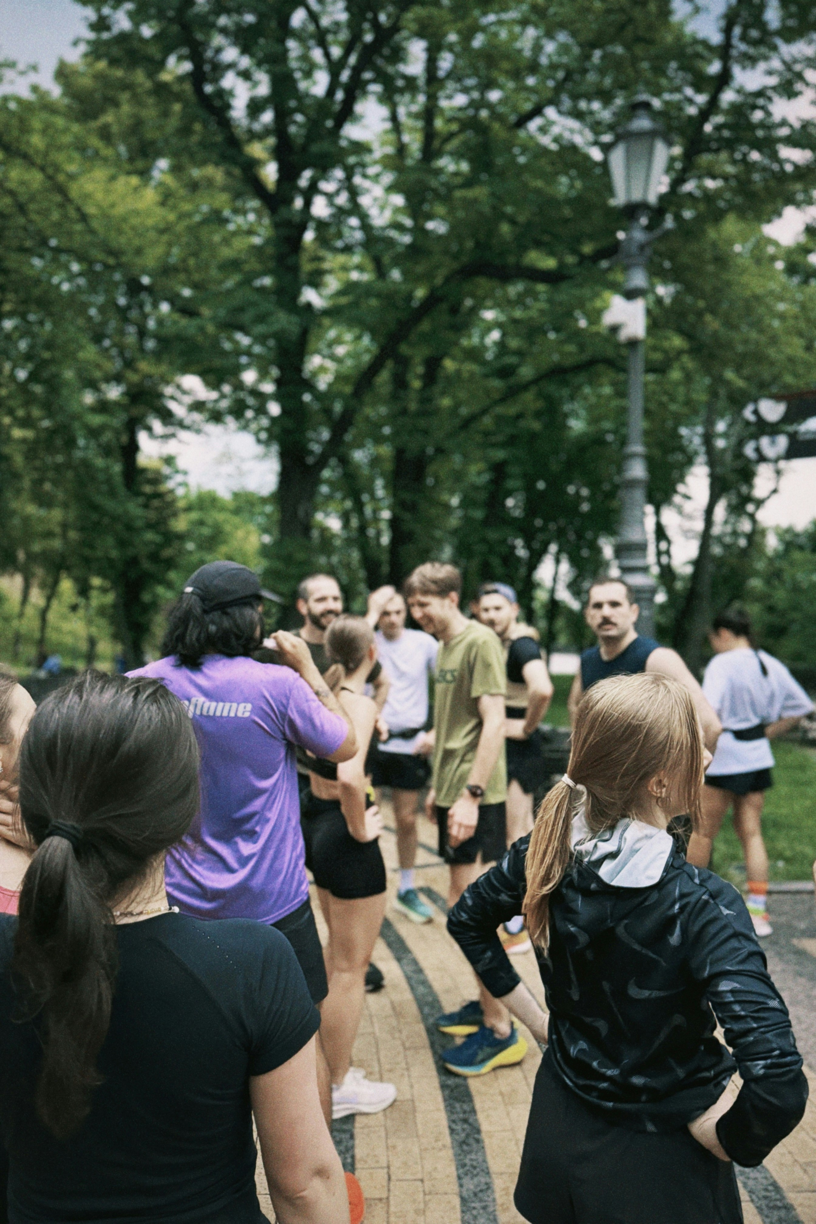 Group fitness training outdoors with diverse adults at Ubuntu Performance Institute