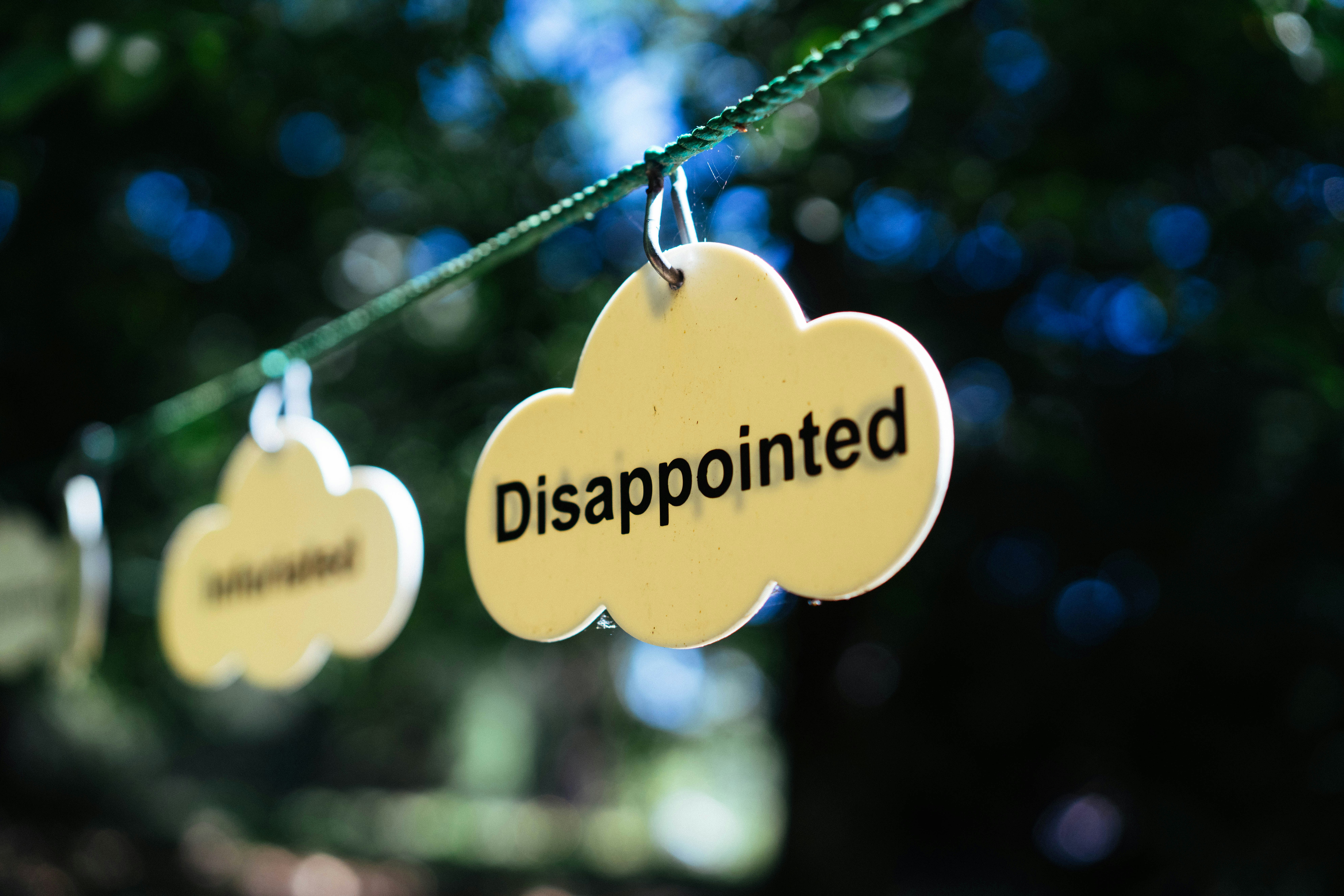 Tags shaped like clouds show disappointment.