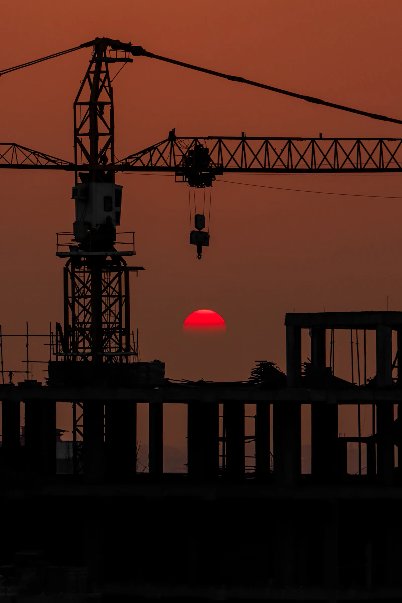 Steel structure frame in progress at sunset
