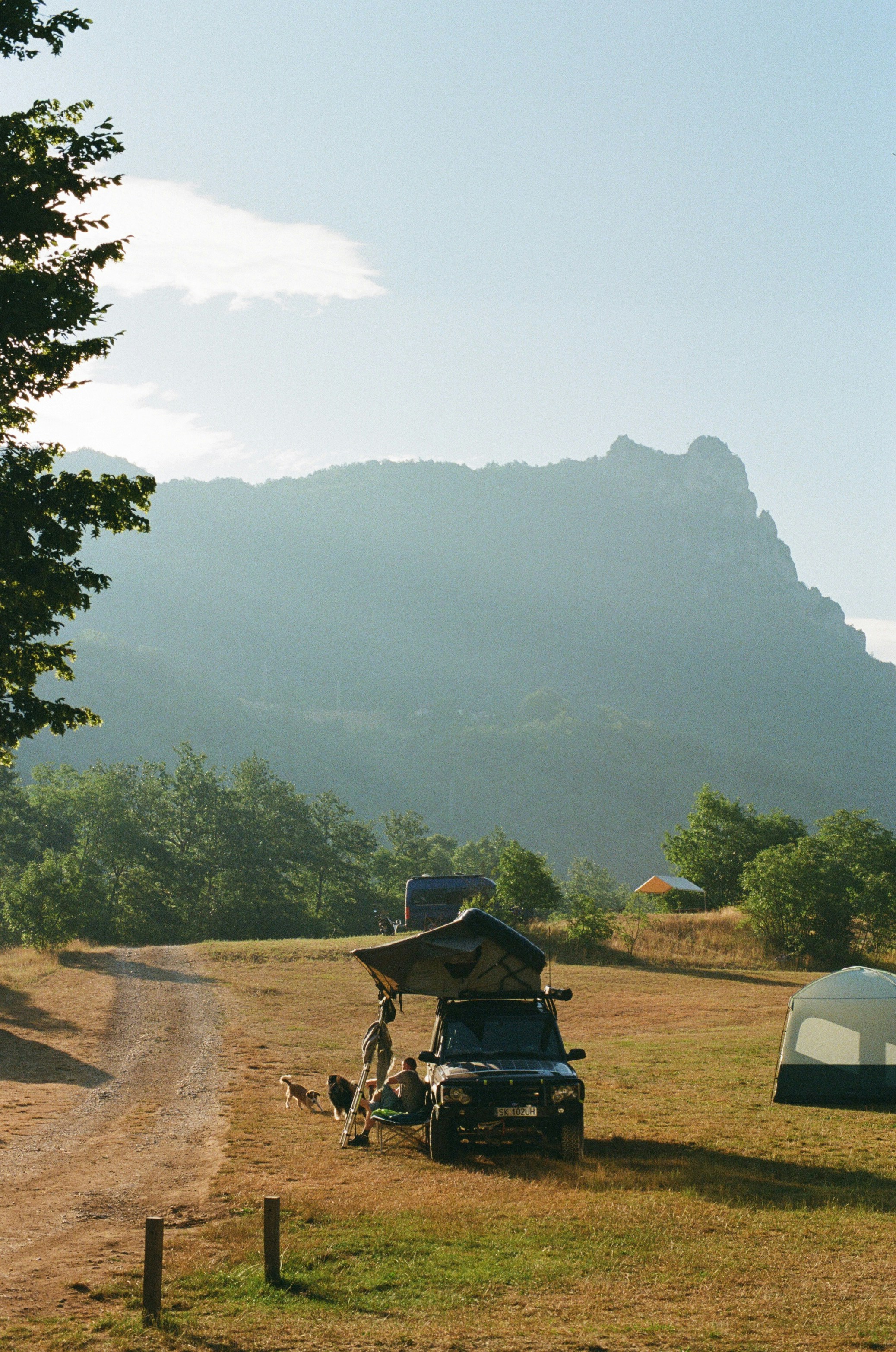 Camping in the mountains with a rooftop tent.