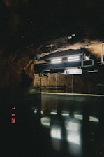 Subway platform reflected in the water.