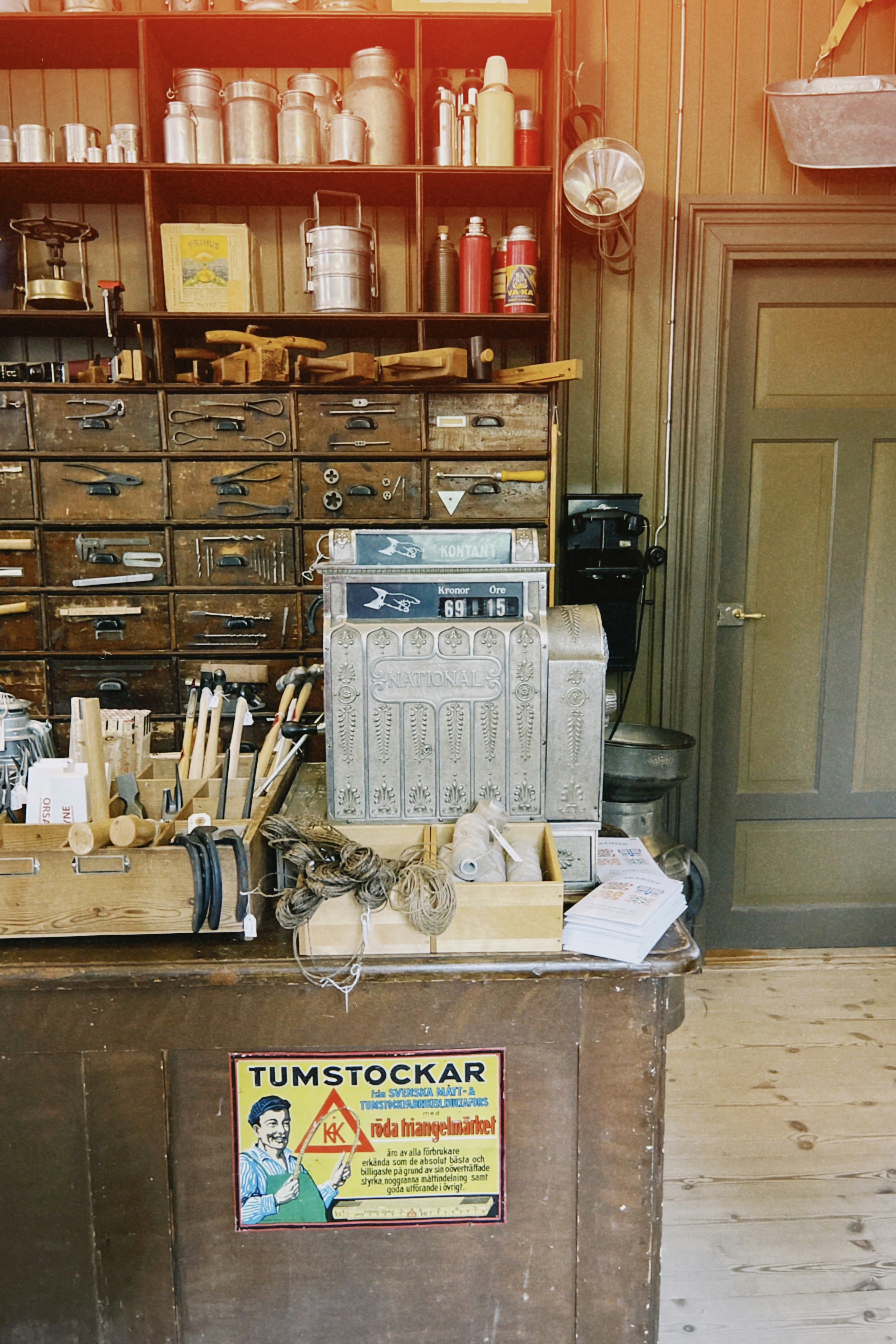 An antique shop with old tools and a cash register. photo – Free Sweden ...