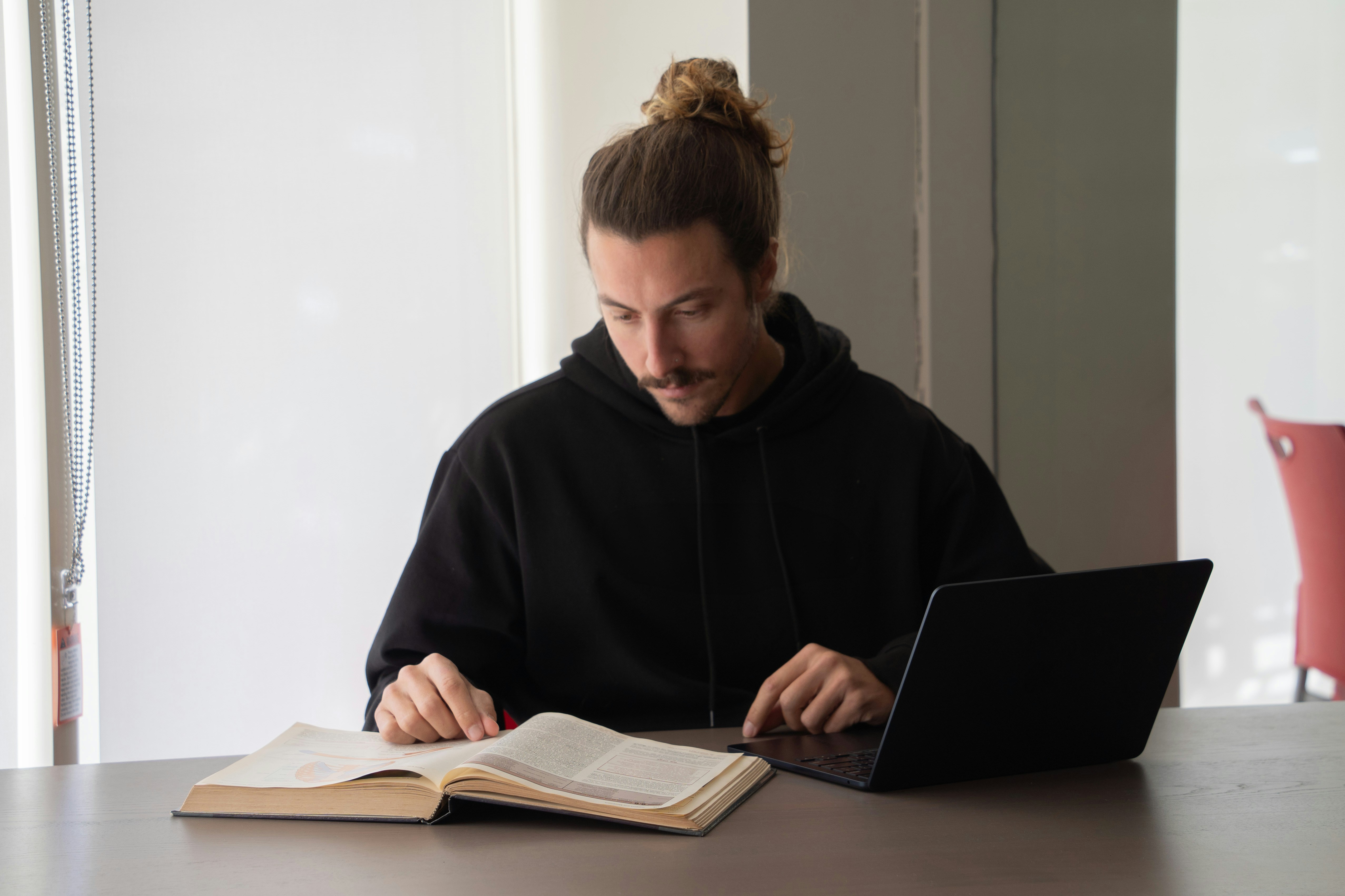 Man focused on laptop work