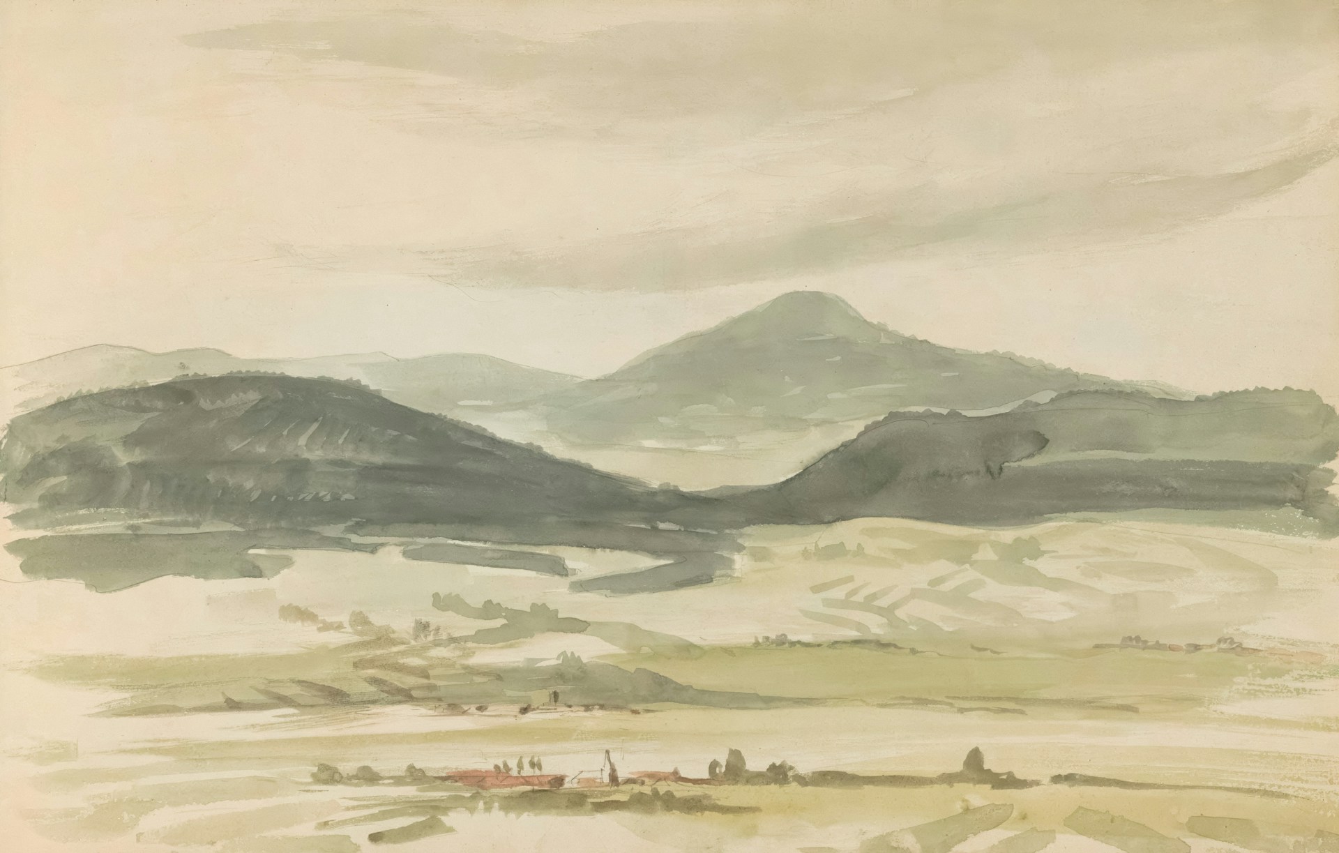 Hills and distant mountains with a small village below.