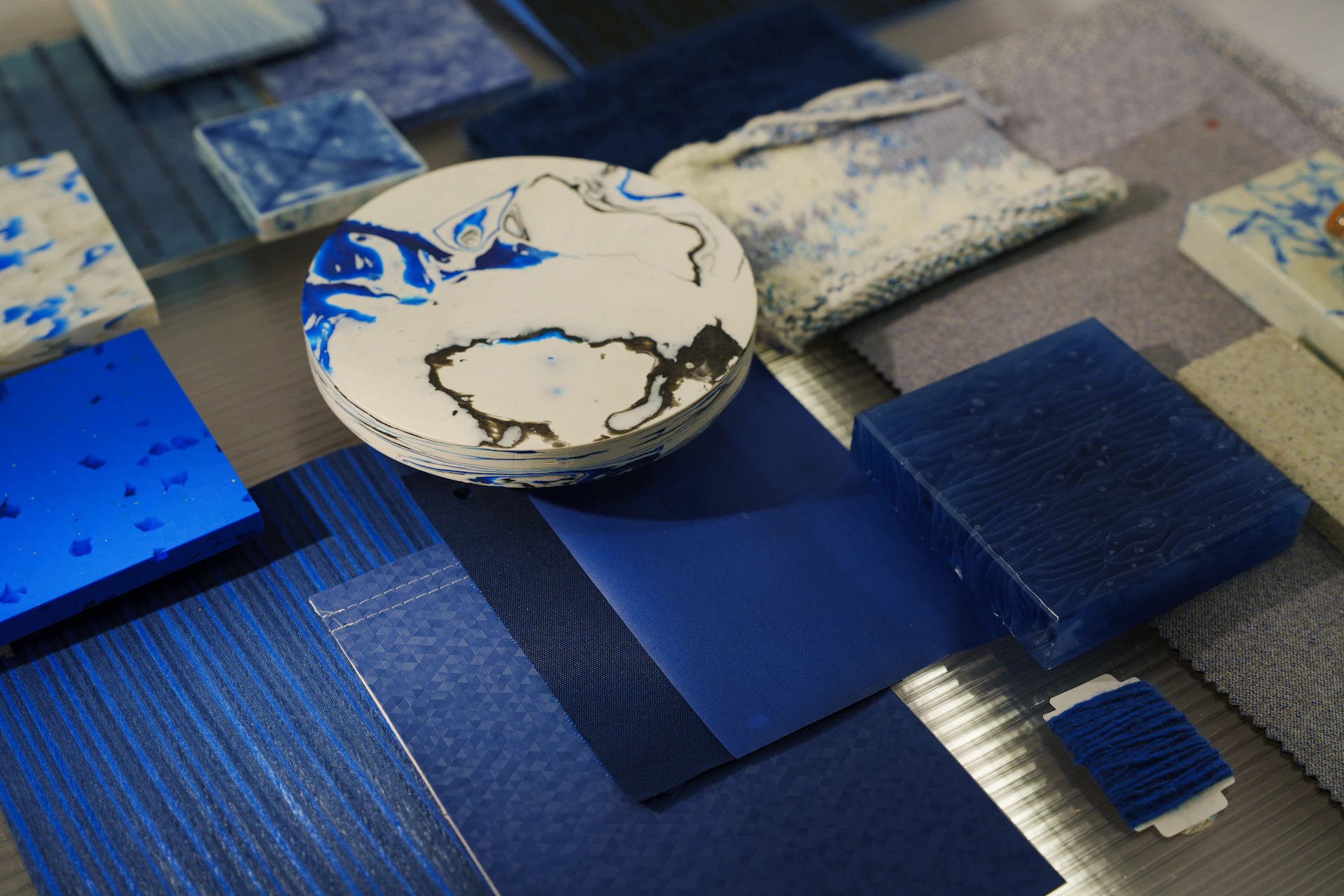 Assorted blue and white materials are displayed.
