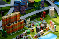Miniature buildings make up a detailed city scene.
