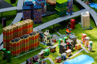 Miniature buildings make up a detailed city scene.
