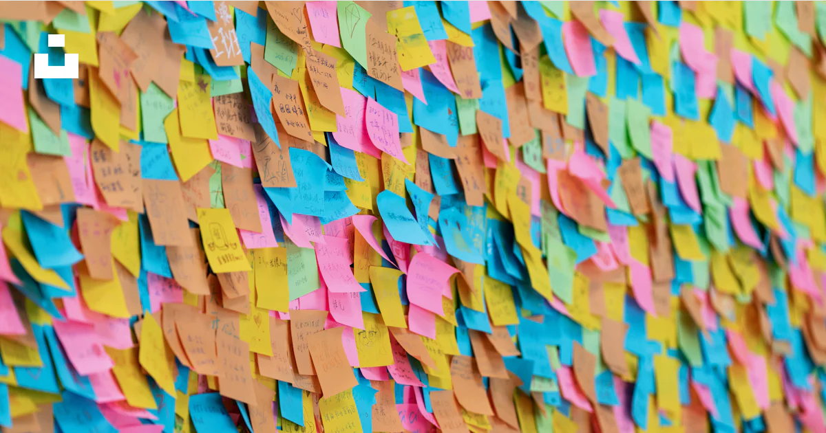 Colorful sticky notes cover a large surface. photo – Free Work Image on ...