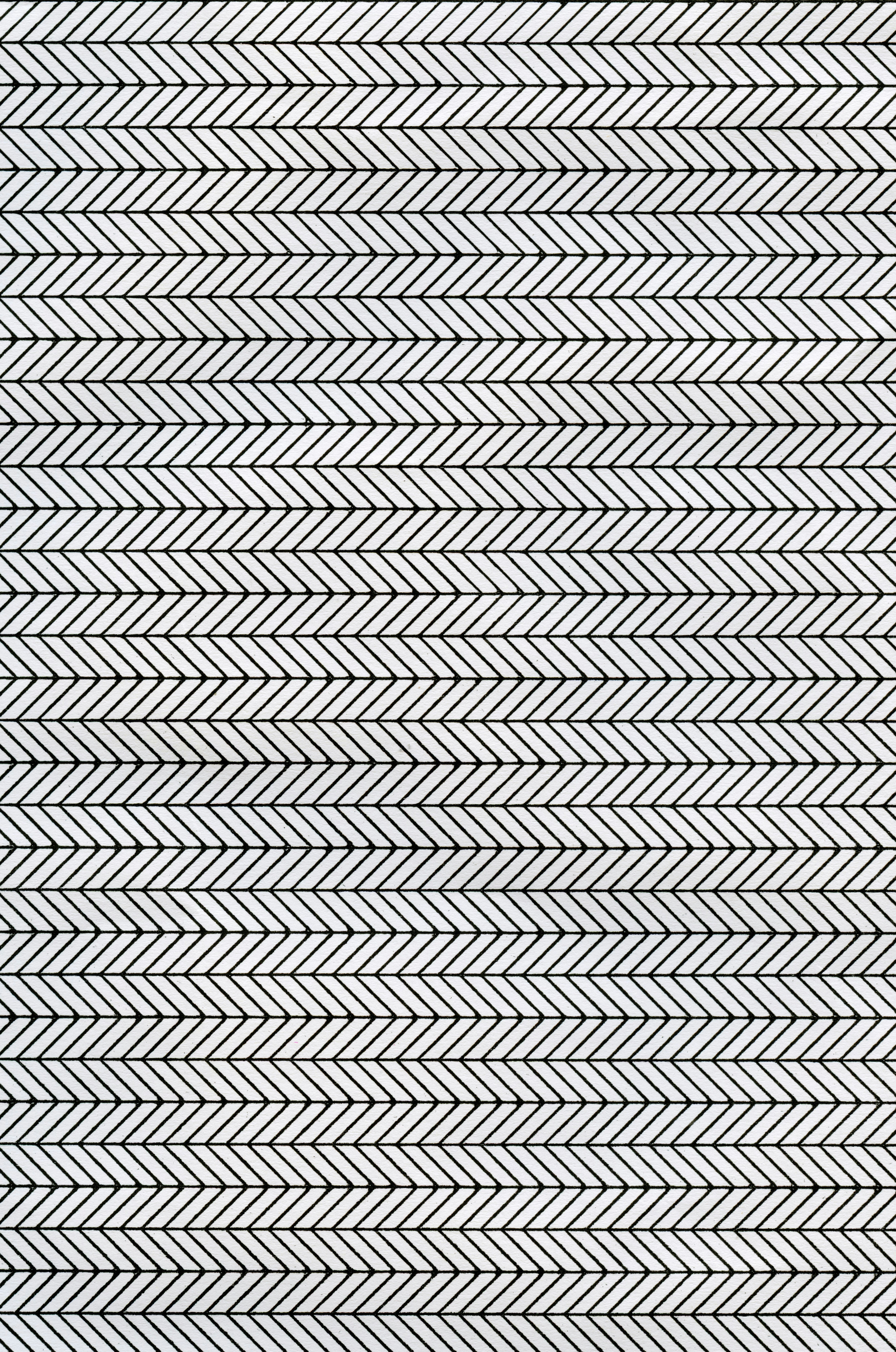 Herringbone pattern creates a repeated, chevron-like design.