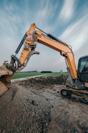 An excavator digs in a construction site.