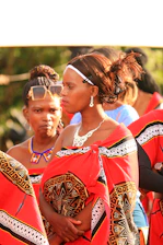 Women are wearing traditional clothing and jewelry.