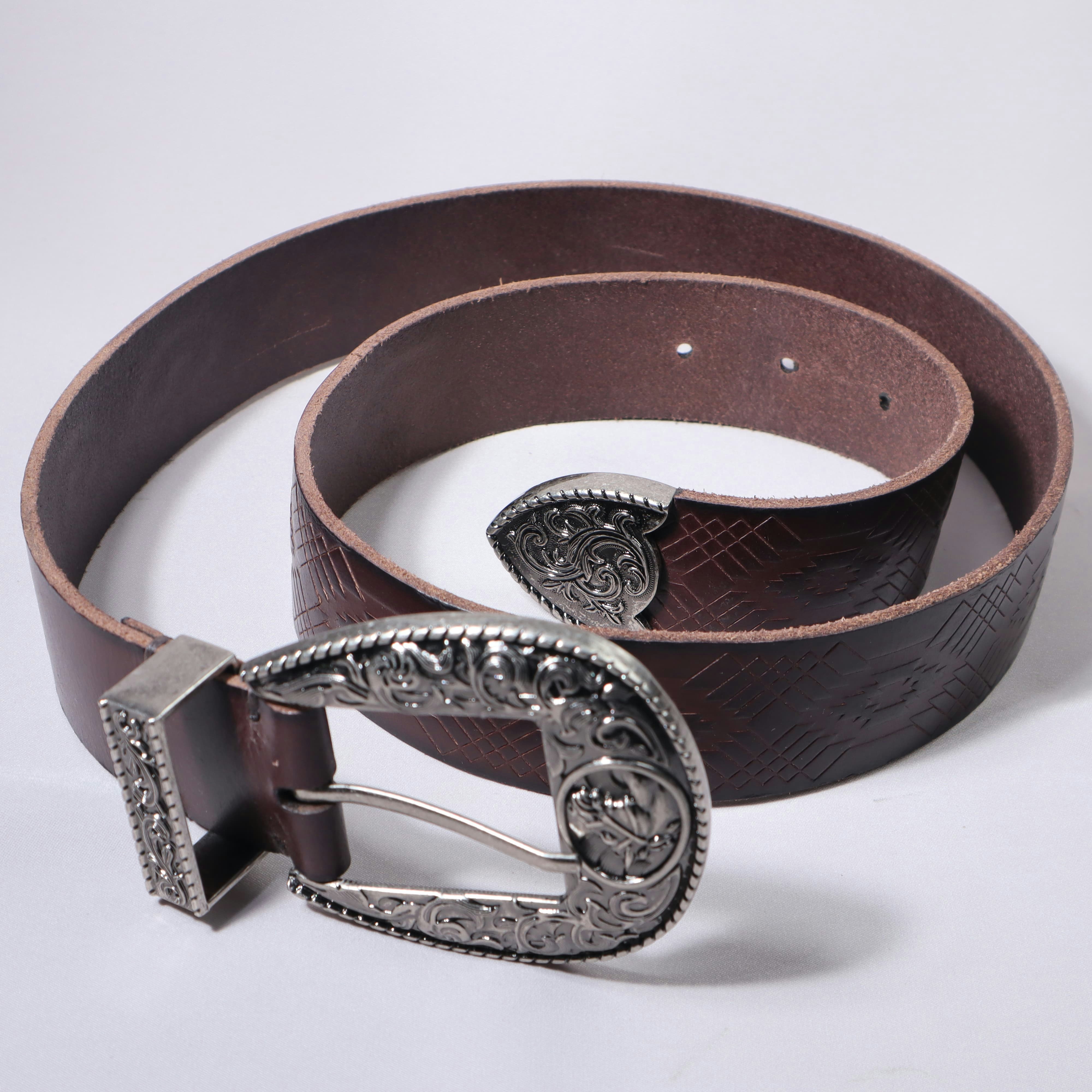 A brown leather belt with a decorative buckle.