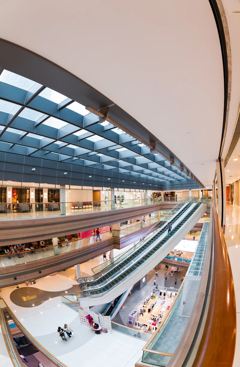 Shopping mall with multiple levels and escalators