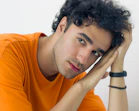 A man is gazing at the camera