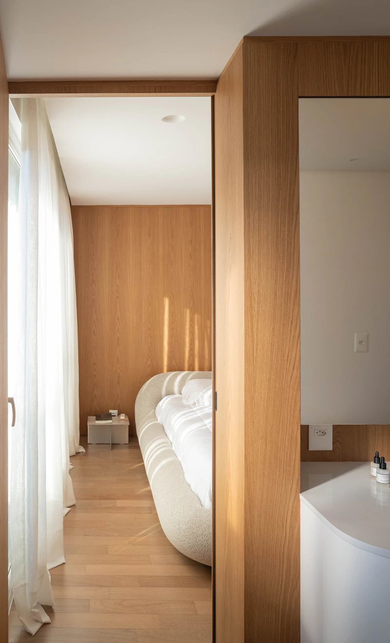 A timber doorway into the bedroom