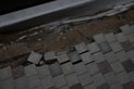 Damaged paving stones are being repaired.
