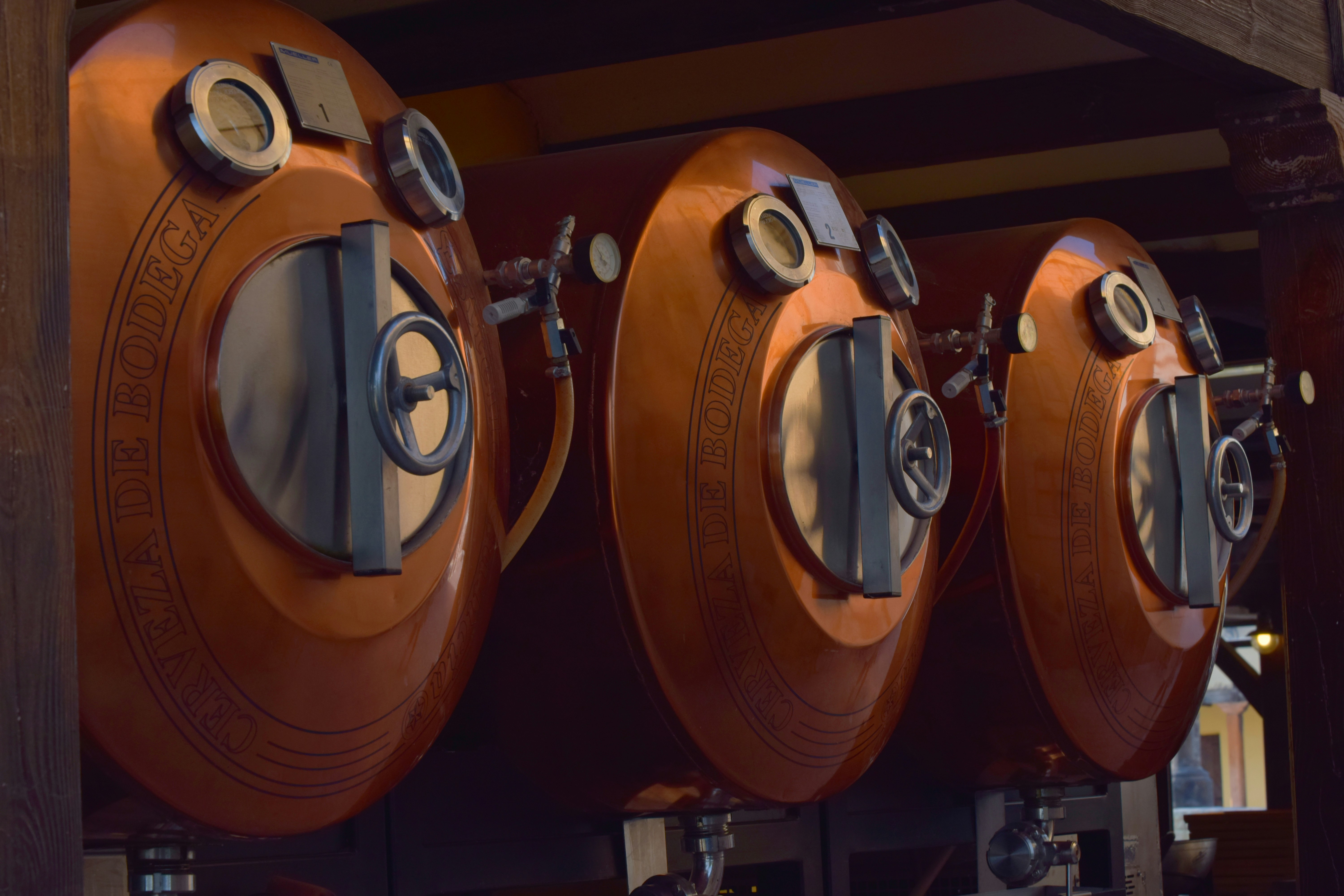 A modern distillery setup with copper stills and fermentation tanks - vodka in Chicago
