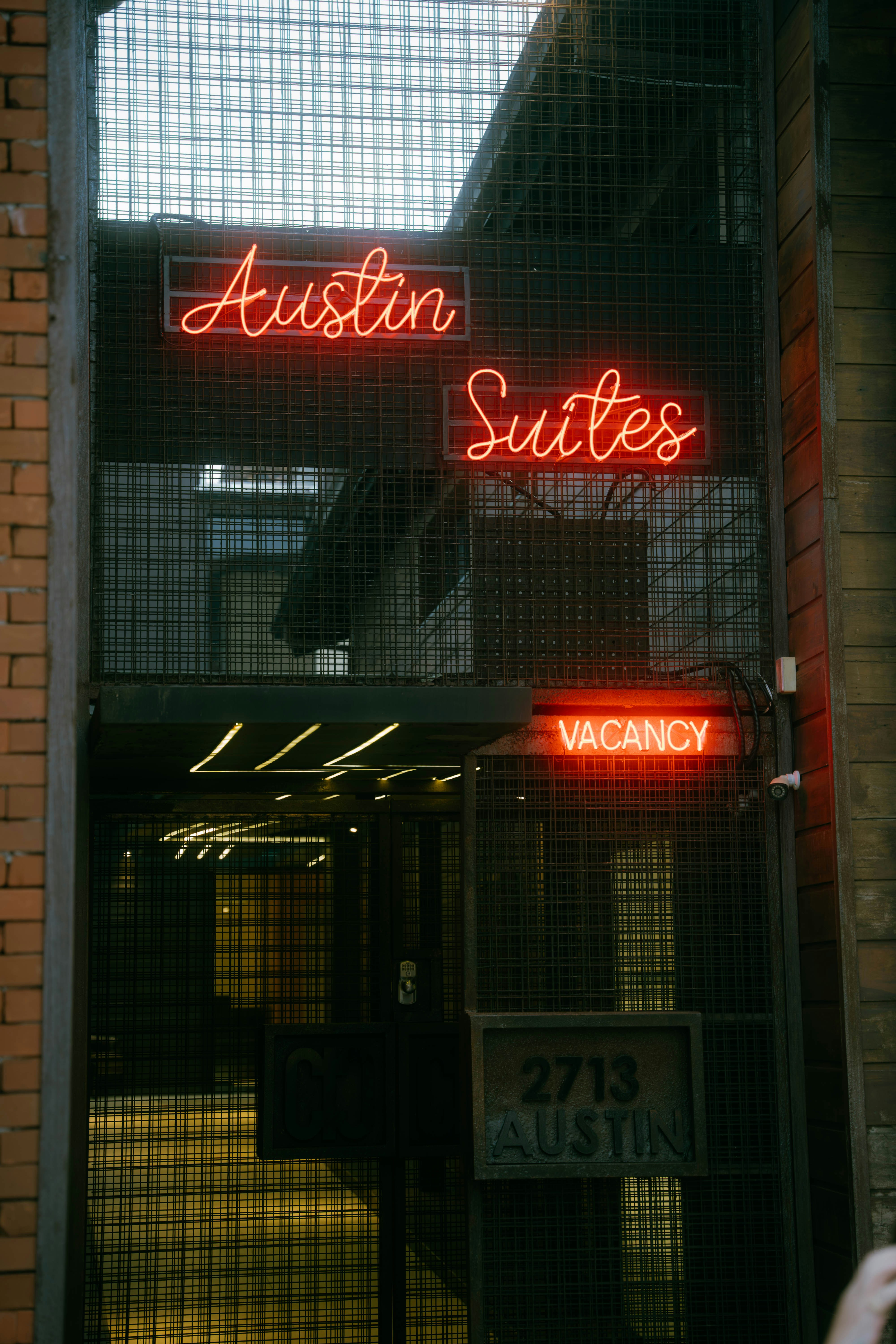 Austin suites with vacancy sign on display.