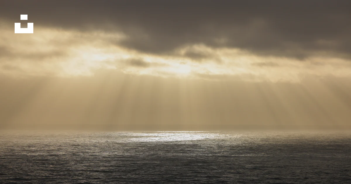 Unsplash Light Rays Rays of light break through the cloudy sky. photo – Free Beach Image on ...