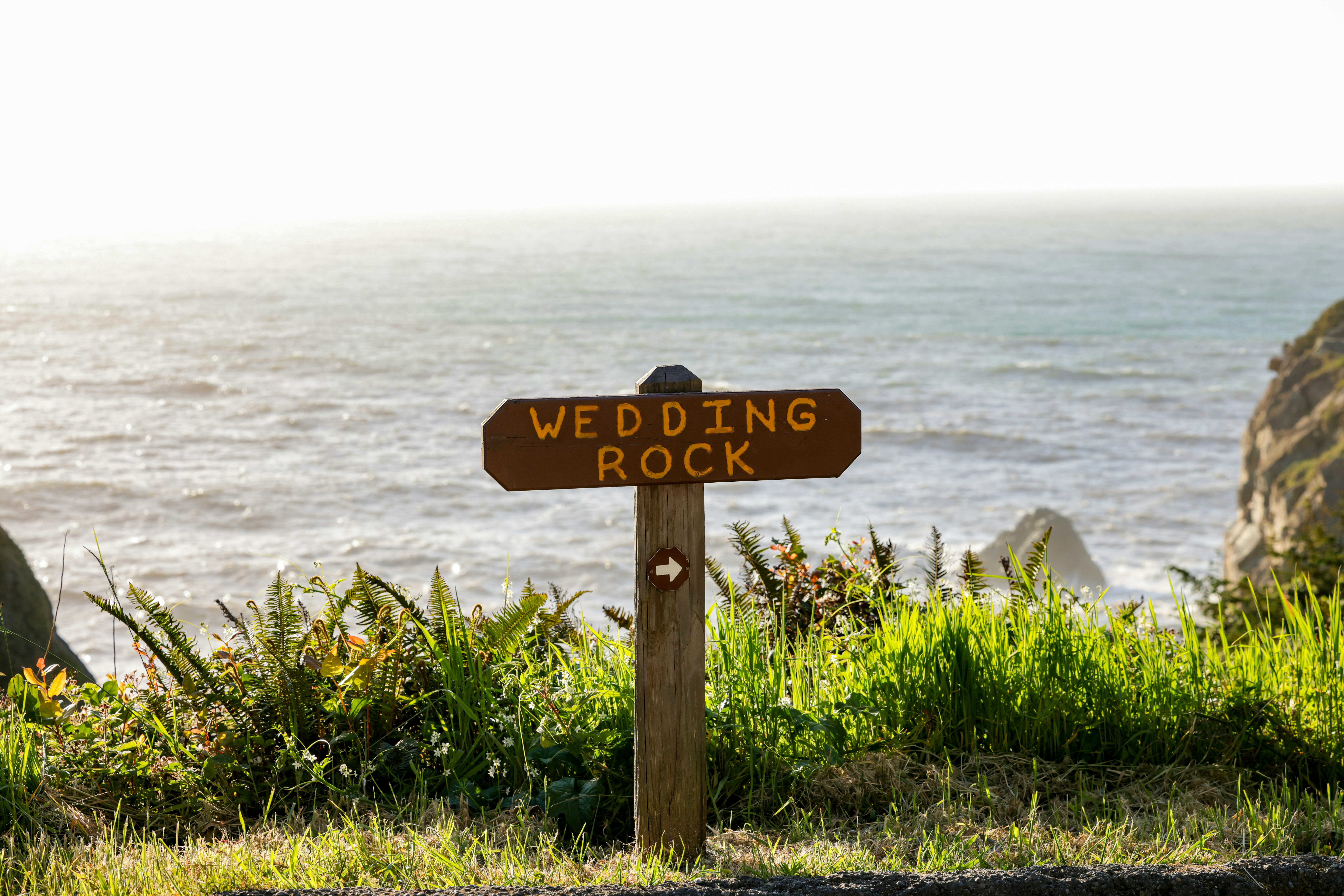 A sign points the way to wedding rock