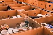Boxes filled with various items are shown