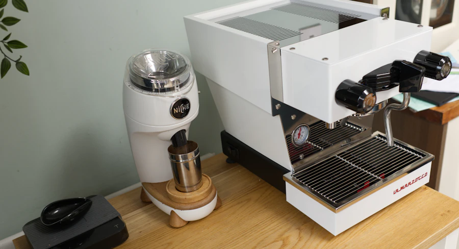 Espresso machine with a coffee grinder in a home coffee setup