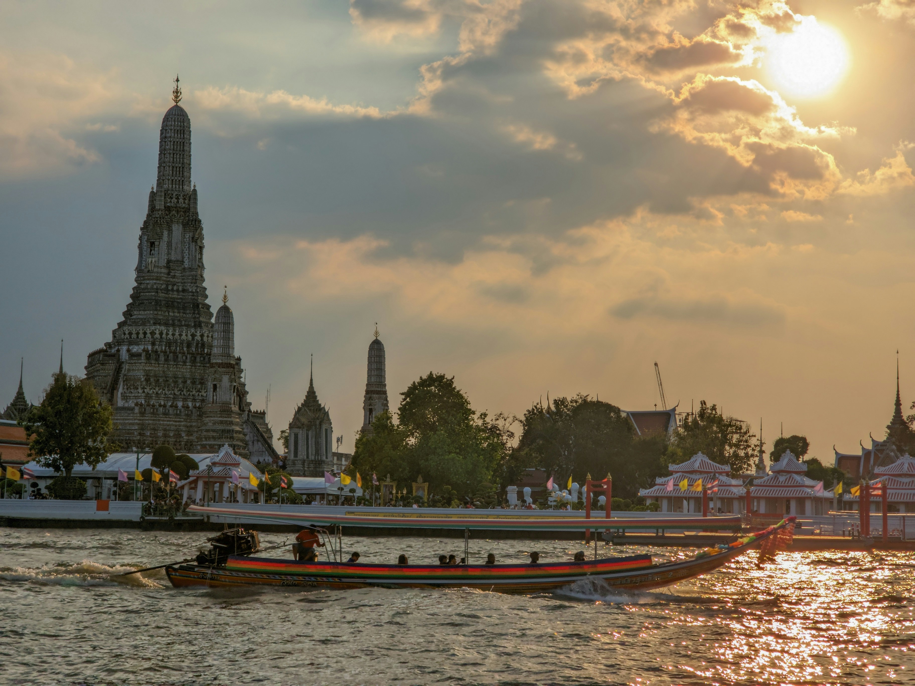 Wat Arun and the Chao Phraya River at sunset