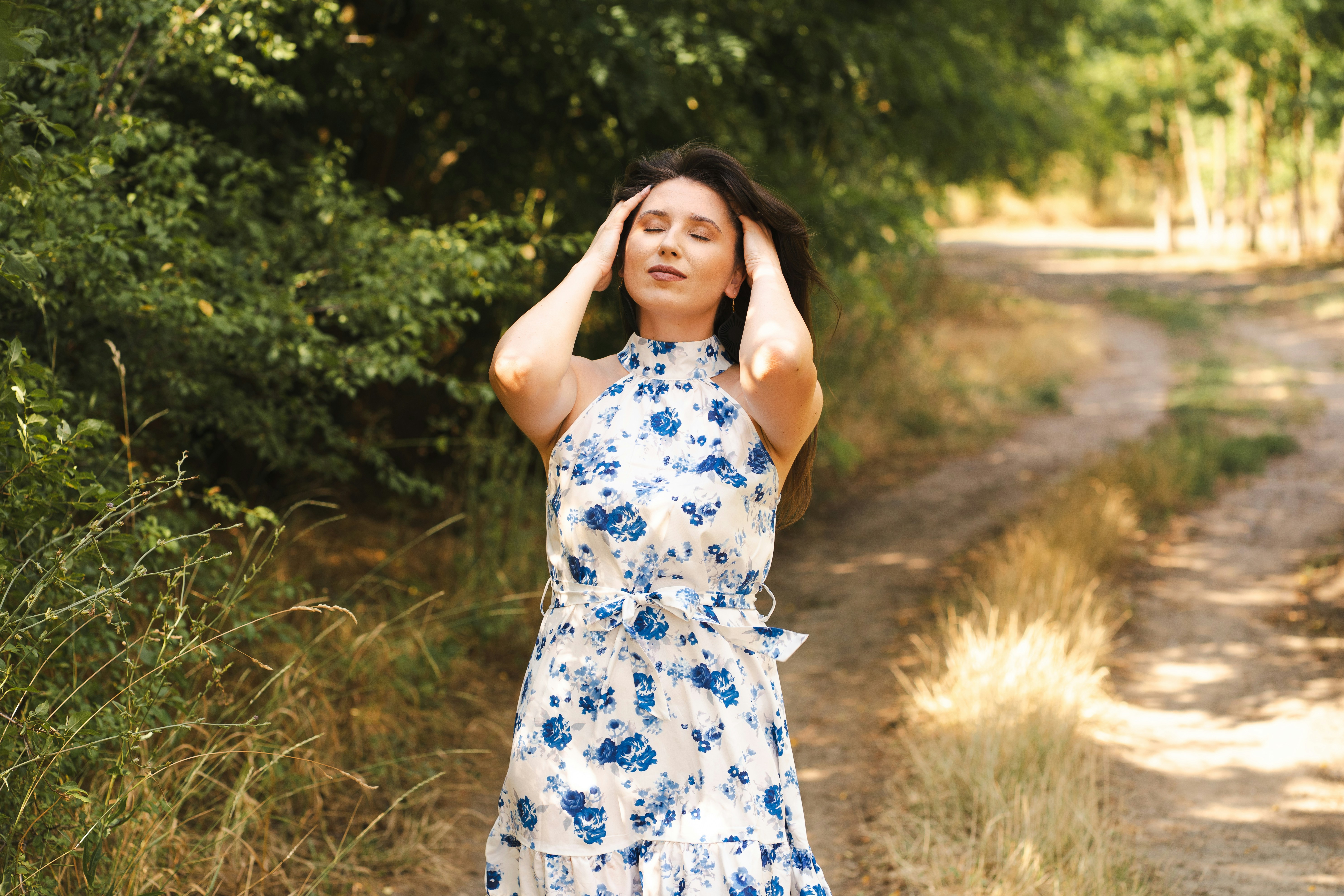Woman enjoying sunlight outdoors
