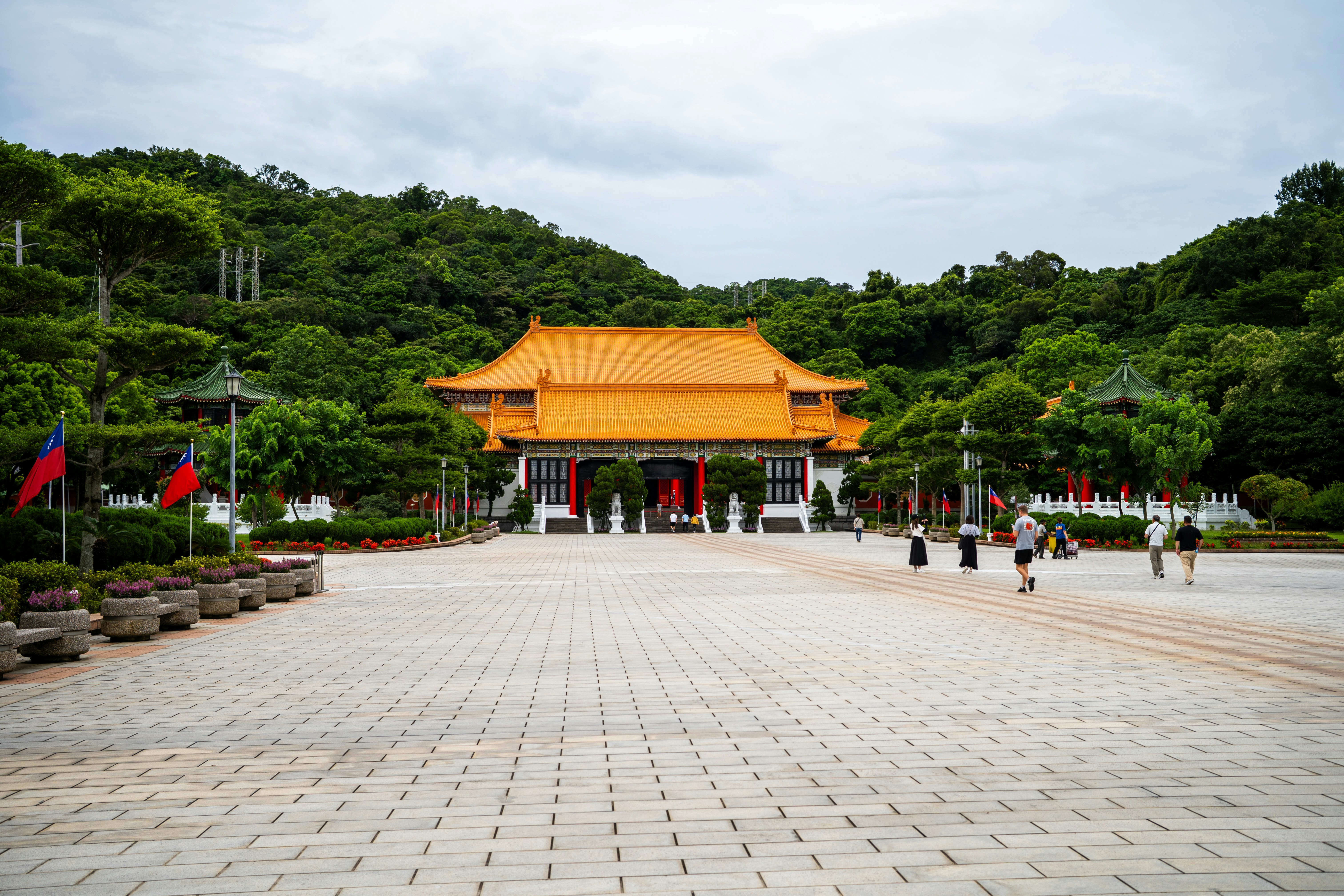 A temple with a large orange roof.