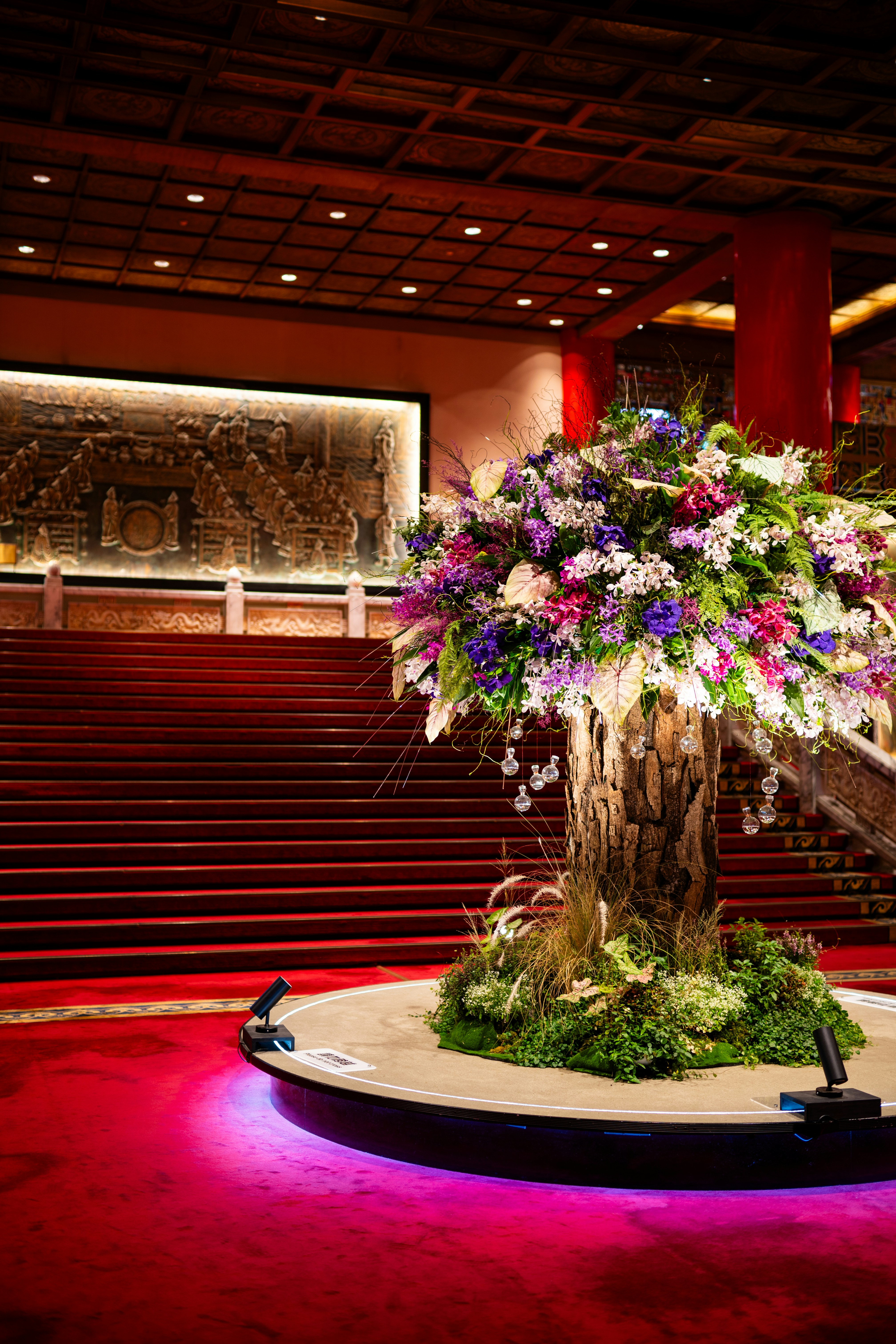 Luxury corporate flowers displayed at a modern business event venue