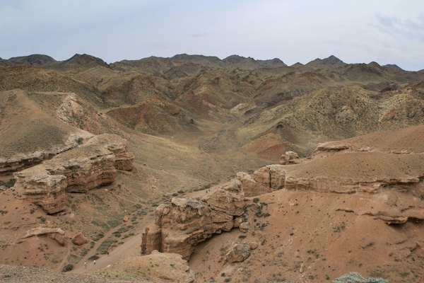 Red and brown mountains stretch across the horizon — Charyn Canyon, Kazakhstan