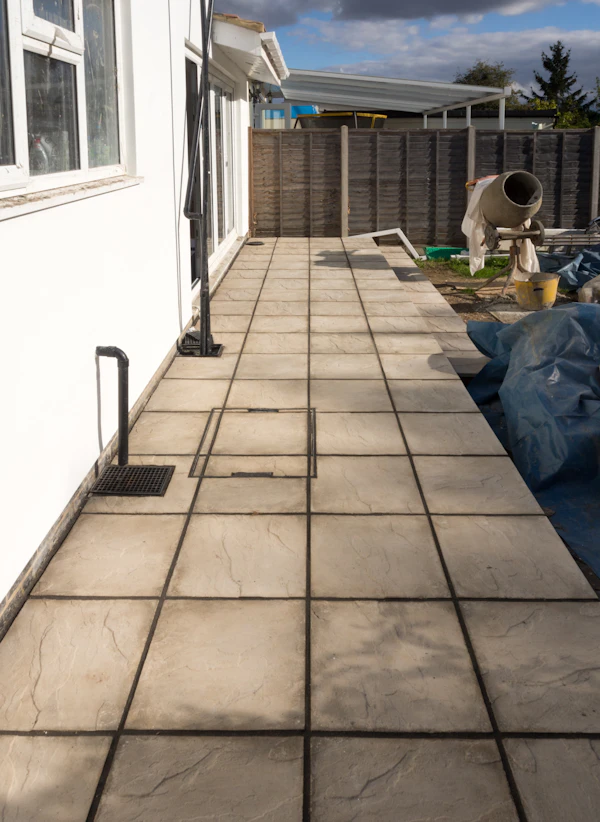 Outdoor Living Budget Planning: Newly tiled patio in the backyard.