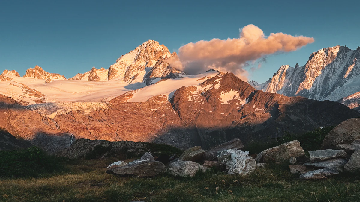 Morning light on snowy granite peaks and a glacier near Chamonix