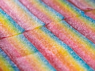 Rainbow candy stripes arranged in a close up shot.