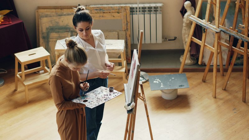Teacher helping a child