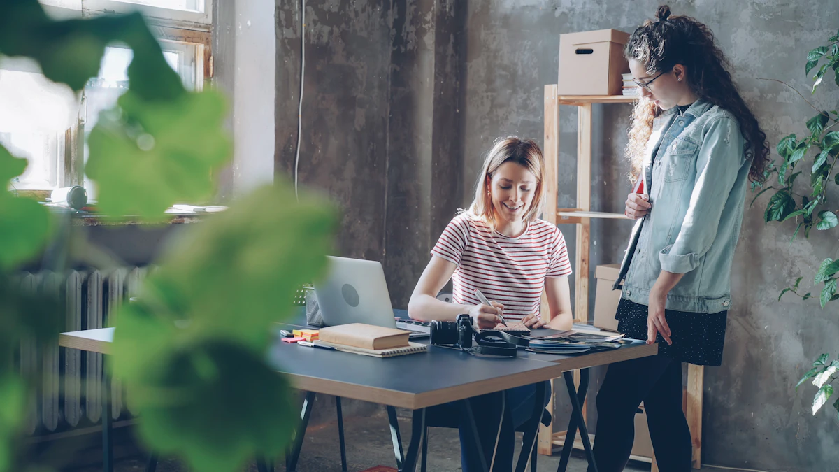 Two people collaborating at a desk