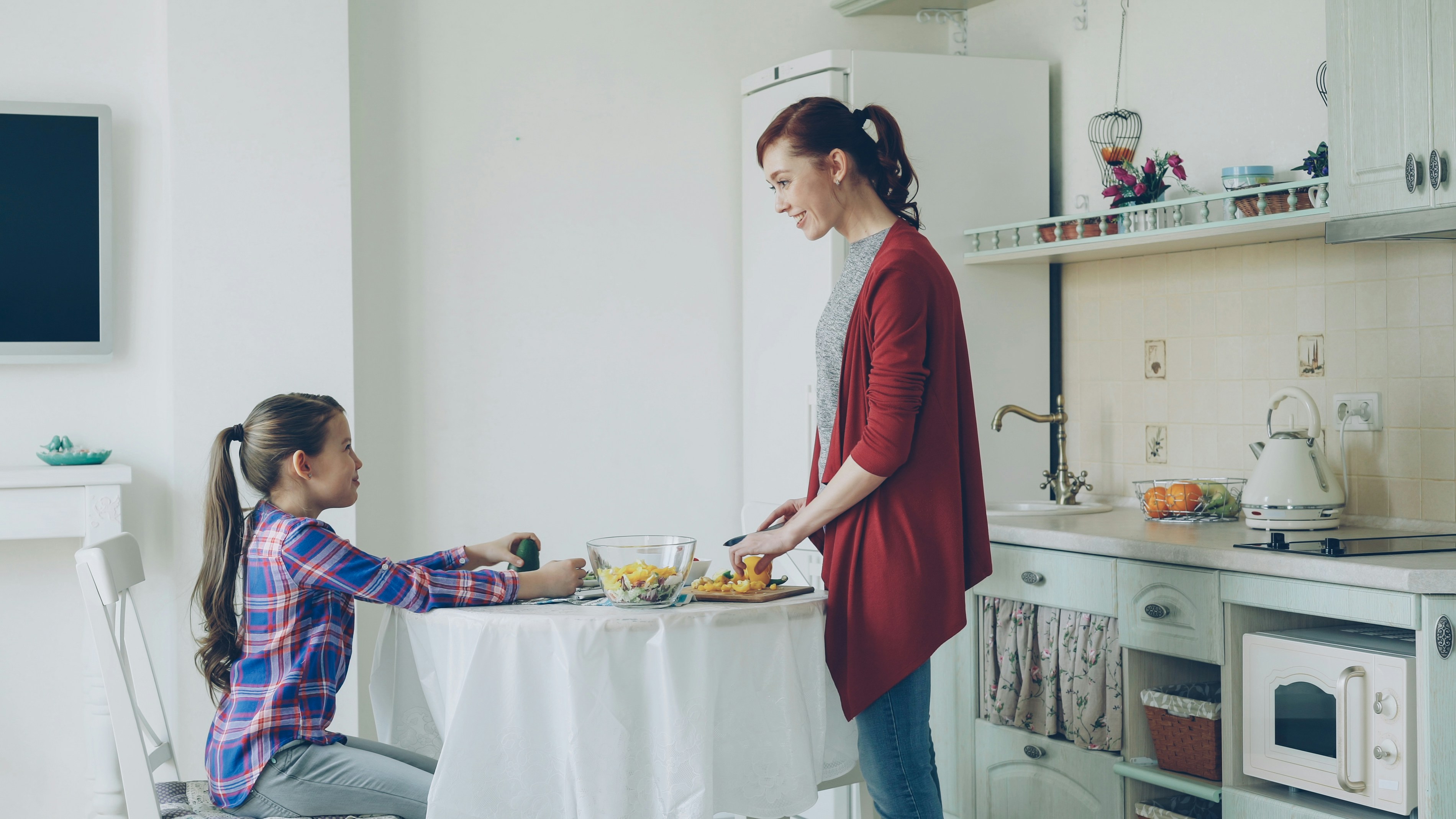 Mother and daughter in kitchen