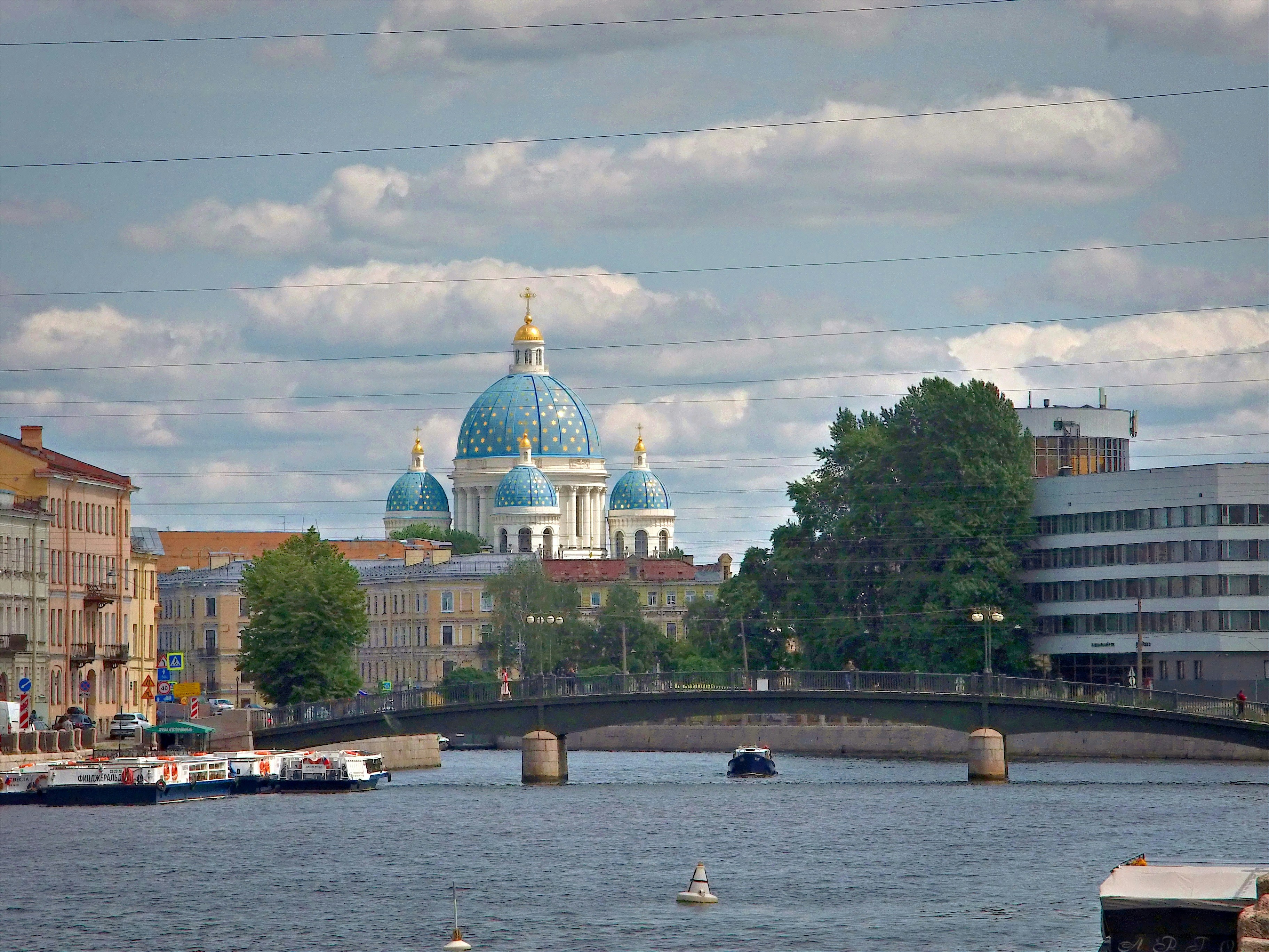 Blue domed cathedral overlooks a river and bridge., Санкт-Петербург, Фонтанка, Набережная р. Фонтанки, Собор Святой Живоначальной Троицы Лейб-Гвардии Измайловского полка