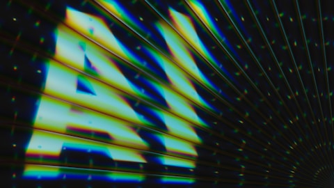 "a.n. is gleaming in colorful, diagonal lines."