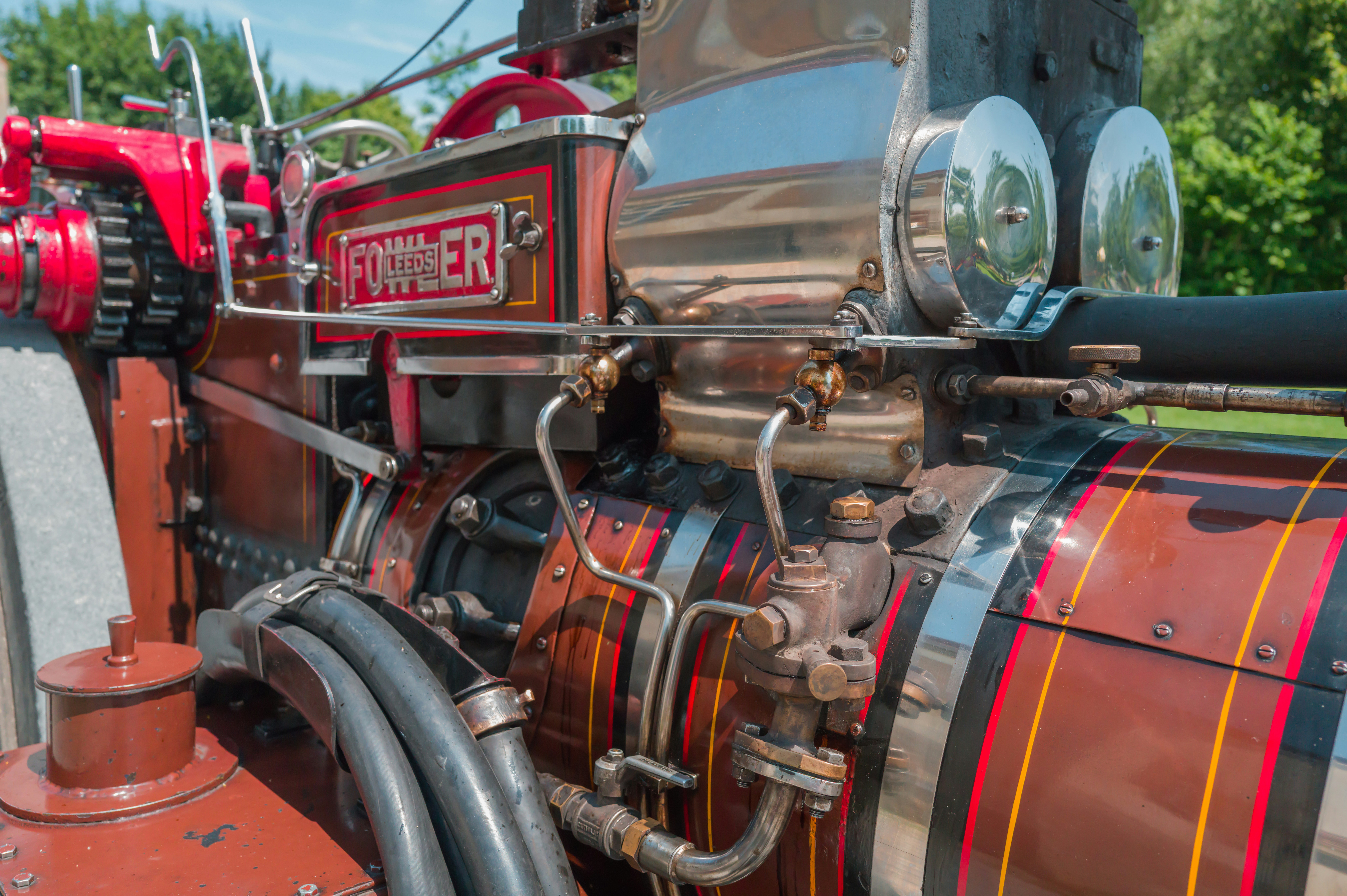 Close-up of a vintage steam engine's mechanical parts.