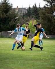 Soccer players are in action during a game.