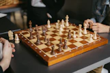 People are playing a game of chess together