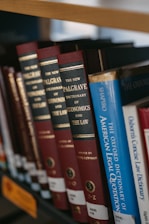 Books on a shelf in a library.