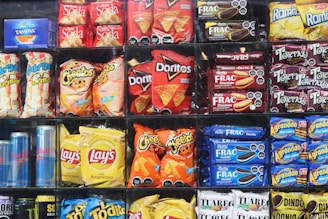 Vending Machine Shelves are filled with various snacks and drinks.