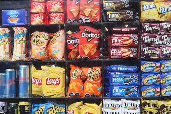 Vending Machine Shelves are filled with various snacks and drinks.