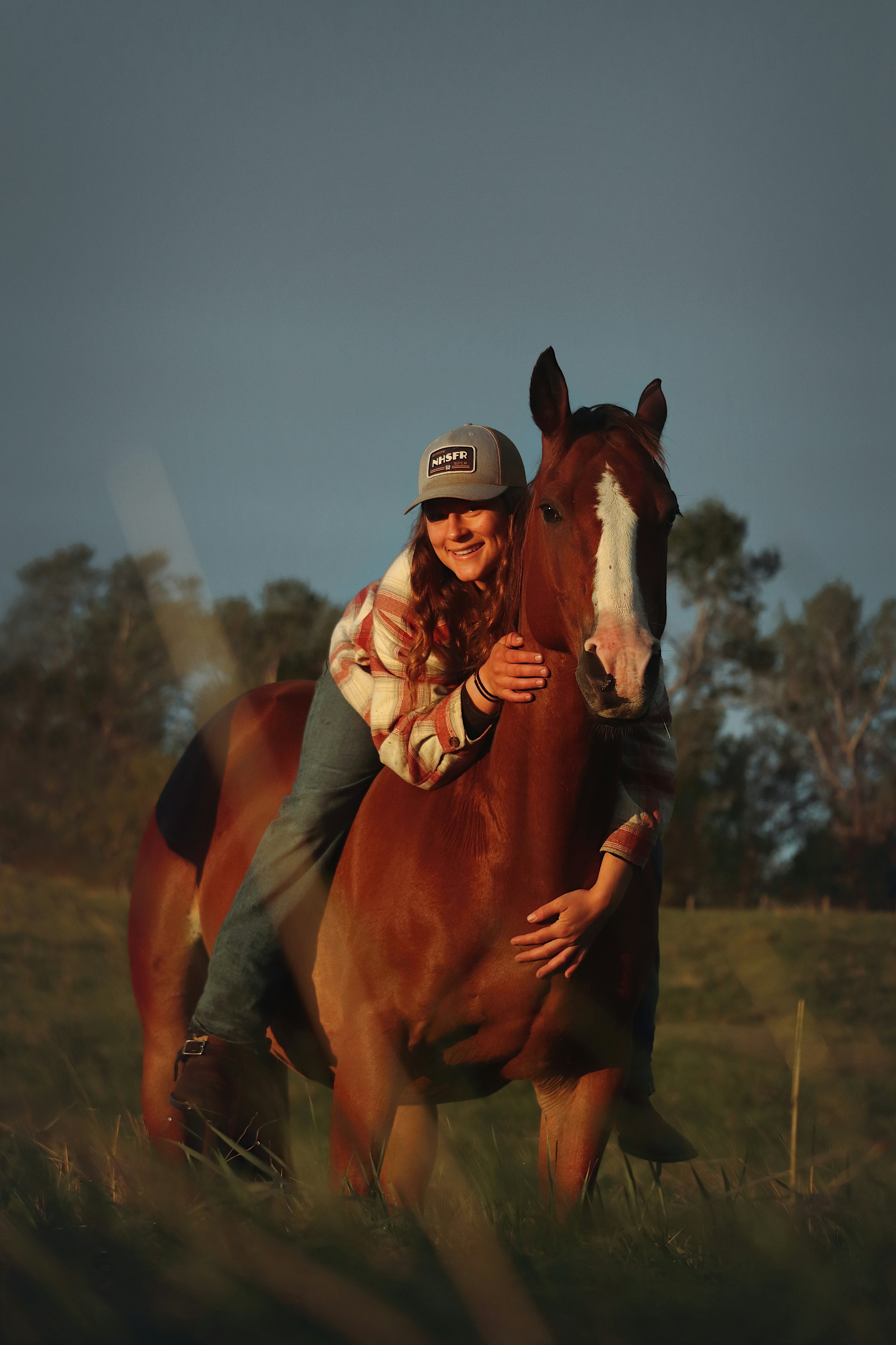 Woman and horse: best friends in the field.